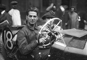 http://upload.wikimedia.org/wikipedia/commons/9/94/Ralph_DePalma_at_the_1914_French_Grand_Prix.jpg