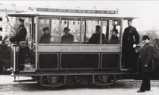 http://upload.wikimedia.org/wikipedia/commons/thumb/9/90/First_electric_tram-_Siemens_1881_in_Lichterfelde.jpg/1024px-First_electric_tram-_Siemens_1881_in_Lichterfelde.jpg