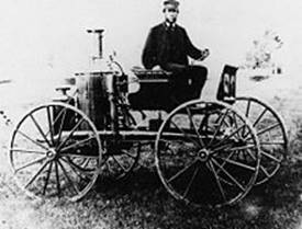 https://upload.wikimedia.org/wikipedia/commons/thumb/2/2e/Sylvester_Roper_steam_carriage_of_1870.jpg/220px-Sylvester_Roper_steam_carriage_of_1870.jpg