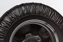 http://b.cdnbrm.com/images/products/relm/wheel_accessories/covercraft_spare_tire_cover_inner.gif